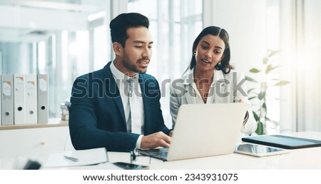 Businessman, laptop and team in finance discussion, project planning or schedule at office. Asian man and business woman working on computer for corporate statistics or financial plan at workplace Royalty-Free Stock Photo #2343931075