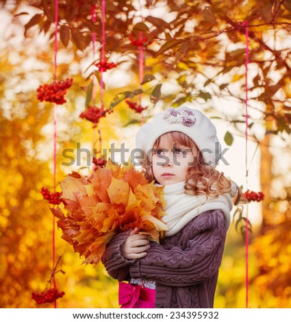 beautiful girl with autumn park