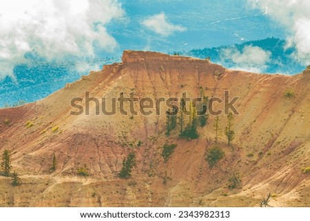 Afternoon Clouds Gathering Over Chessman Ridge and The Amphitheater From The Chessman Ridge Overlook, Cedar Breaks National Monument, Utah, USA Royalty-Free Stock Photo #2343982313