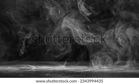 Smoke vapor. Steam cloud. Fume swirl. White fog spreading over grain texture surface on dark black copy space abstract background.
