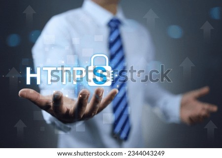 https secured internet concept. Businessman or programmer holding address security website on hand represent more security  domain and https text on log symbol.