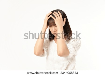 Japanese young  woman having headache