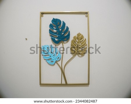 A wall decoration to enhance the space. Made of brass. interior wall