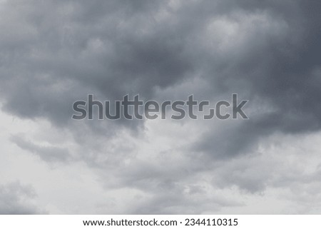 A gray sky with clouds Royalty-Free Stock Photo #2344110315