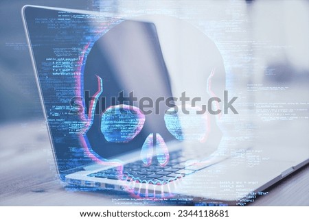 Close up of laptop keyboard with skull hologram on blurry background with coding. Hacking and malware concept. Double exposure