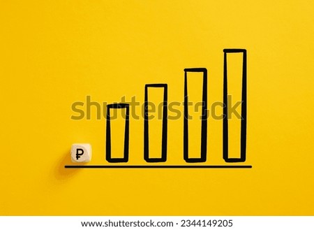 Russian Ruble currency rate growth concept. Business profit increase. Ruble symbol on a wooden cube with an ascending graph.
