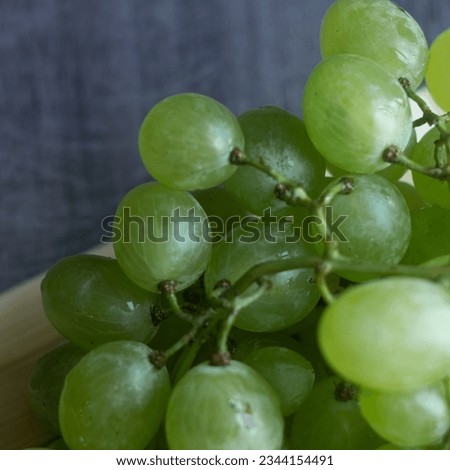 Bunches of green ripe grapes from a near angle. Still Life high definition photography
