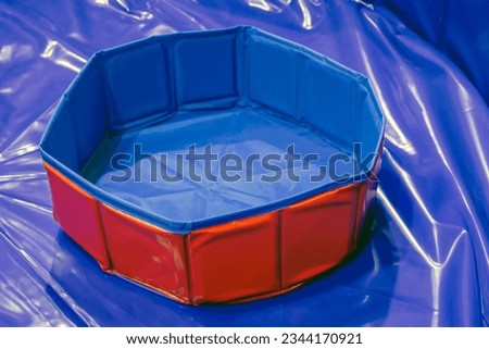 cooling bowl, for pets, with a water bowl on the rubber floor, the bowl cools the water in hot weather