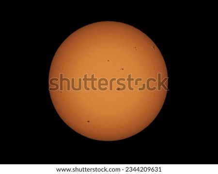 International Space Station ISS transiting the sun, Aug 5, 2023 over Renfrew, Ontario, Canada.  Royalty-Free Stock Photo #2344209631