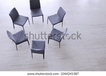 Chairs in a circle with copy space to use text for meeting concept, psychology consultation concept or project presentation 