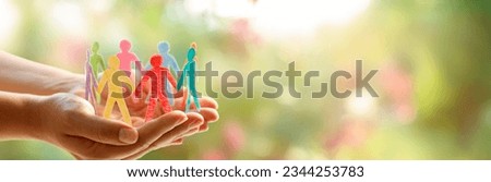 Diversity Inclusion And Equality Concept - Paper People Silhouettes On Hands Royalty-Free Stock Photo #2344253783