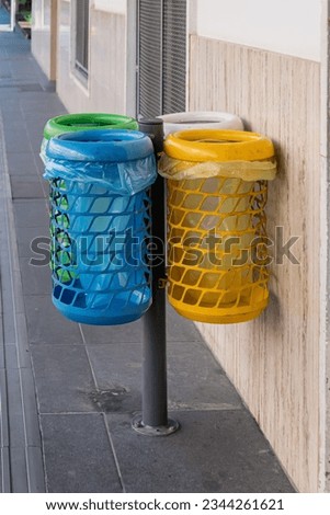 Trash cans - sorting trash into four types in cities in Italy, street space, ecological city