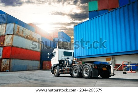 Semi trailer Truck on The Parking Lot, Stacked of Containers Cargo Shipping. Handling of Logistics Transportation Industry. Cargo Container ships, Freight Trucks Import-Export. Distribution Warehouse. Royalty-Free Stock Photo #2344263579