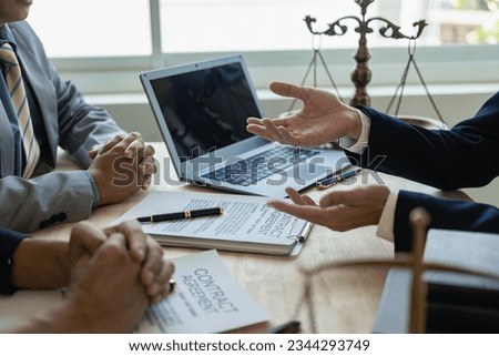 Attorneys are providing information about client hearings at the attorney general's office, the judge consults the client team, legal service concepts. Remote Picture Royalty-Free Stock Photo #2344293749