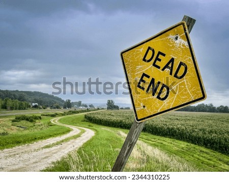 dead end sign on a dirt farm road in Nebraska Royalty-Free Stock Photo #2344310225