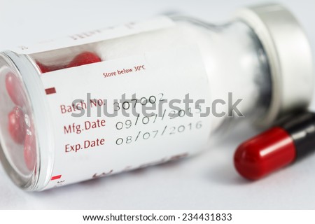 medicine capsule on white background Royalty-Free Stock Photo #234431833