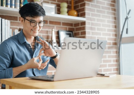 lose up asian man make gesture hand about sign language to teaching or talking to colleague in office meeting room for business lifestyle concept