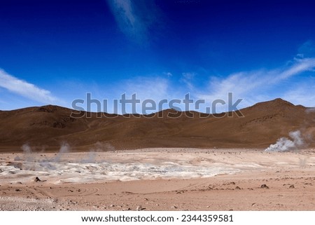 Stunning geothermic field of Sol de Mañana with its steaming geysers and hot pools with bubbling mud - just one sight on the lagoon route in Bolivia