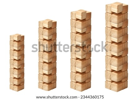 Towers from wooden blocks isolated on a white. Concept of technology, business, construction planning. Copy space. Wood blocks game. Building blocks for children.