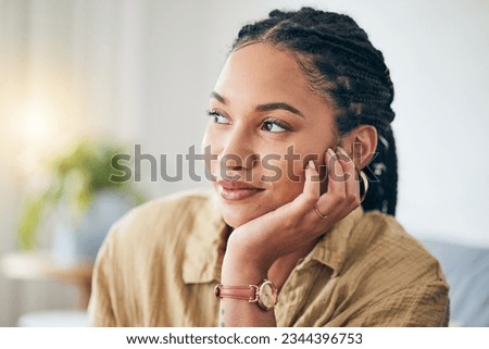 African woman, thinking and idea for future in home, interior design or decoration of apartment, living room or house. Girl, relax and lounge on sofa with inspiration, goals or planning for life Royalty-Free Stock Photo #2344396753
