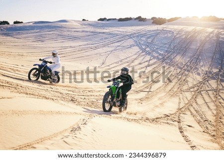 Motorcycle, desert dune and race for speed, competition or outdoor hill for performance, goal or off road. Motorbike athlete, trail or ramp in nature, sand or together for training in summer sunshine