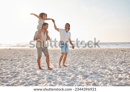 Gay couple, piggyback and holding hands with family at beach for seaside holiday, support and travel mockup. Summer, vacation and love with men and child in nature for lgbtq, happy and walking Royalty-Free Stock Photo #2344396921