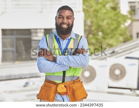 Black man, portrait and construction worker, arms crossed and maintenance, engineer smile and architecture outdoor. Male contractor, professional renovation and urban infrastructure with handyman Royalty-Free Stock Photo #2344397435