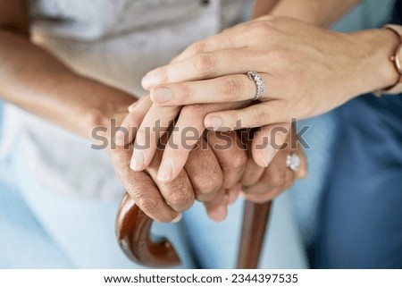 Empathy, medical and holding hands with sold woman and nurse for hope, support and healthcare. Trust, compassion and kindness with closeup of people in nursing home for volunteer, help or retirement Royalty-Free Stock Photo #2344397535