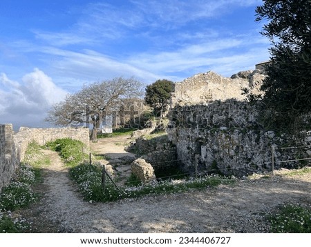 Ancient stone ruins of cliff fortress Angelocastro, Corfu island, Greece. High quality photo