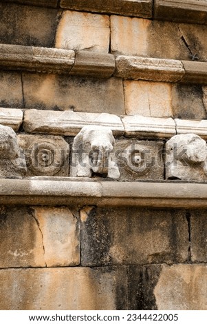 Ancient brick wall with hinduism symbol elephant 