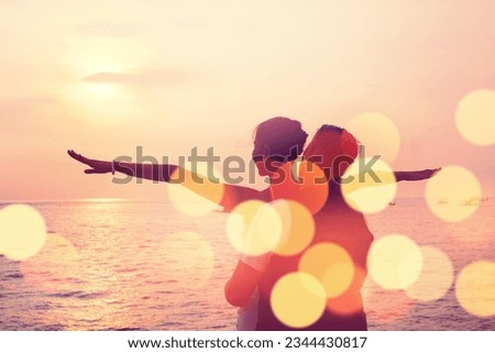 Silhouette of couple hugging on the boat, Romantic lovers dancing on celebration event at the yacht deck,Silhouette romance scene marriage anniversary over sunset, luxury, happiness. romantic moment