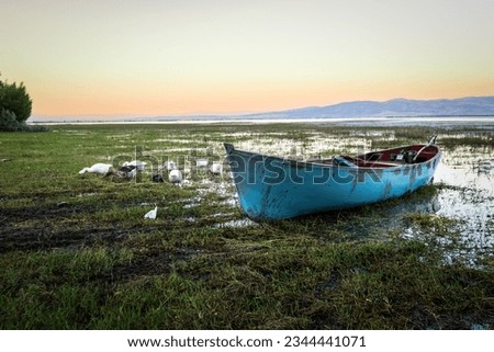 Civril, Denizli, Türkiye, 10 July 2023; Water pollution and drought problem in Işıklı Lake, where fishing boats descend, global warming.