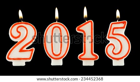 Burning candles on black background, number 2015, new year concept