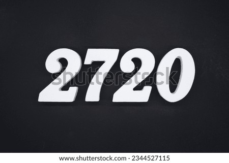 Black for the background. The number 2720 is made of white painted wood.