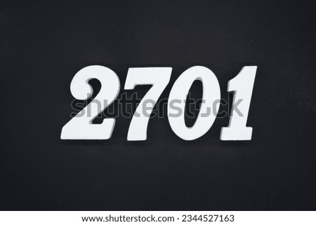 Black for the background. The number 2701 is made of white painted wood.