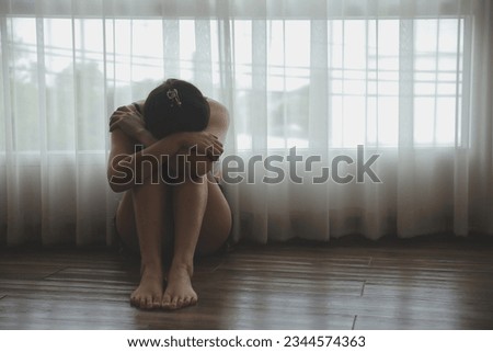 panic attacks alone young girl sad fear stressful depressed emotional.crying use hand cover face begging help.stop abusing domestic violence in women,person with health anxiety,people bad feeling down Royalty-Free Stock Photo #2344574363