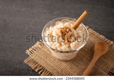 Rice pudding. Sweet dish made by cooking rice in milk and sugar, some recipes include cinnamon, vanilla or other ingredients, it is a very easy dessert to make and very popular all over the world. Royalty-Free Stock Photo #2344588045