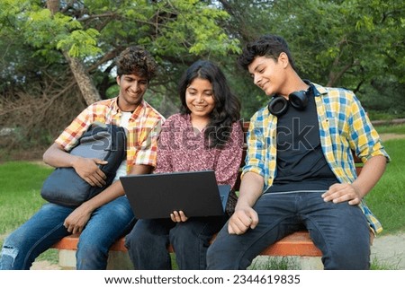 Three Students sitting ion the bench Sitting in the park. dressed in casual clothing. Teenagers Asian lifestyle Educational concepts
 Royalty-Free Stock Photo #2344619835