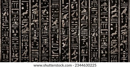 Old Egyptian hieroglyphs on an ancient background. Wide historical and culture background. Ancient Egyptian hieroglyphs as a symbol of the history of the Earth.  Royalty-Free Stock Photo #2344630225