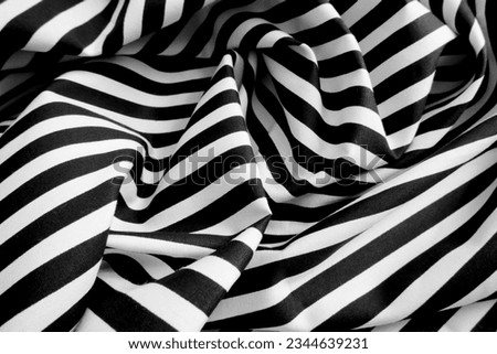 Abstract black and white stripped cloth background