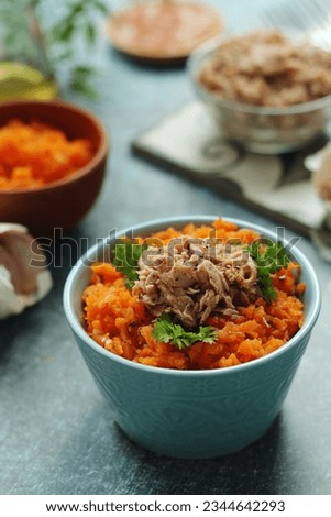 Houria, cooked carrot salad, a traditional dish of Tunisian cuisine Royalty-Free Stock Photo #2344642293