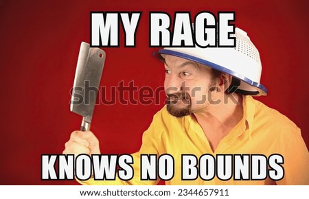 Pop internet culture reaction gif meme: an angry crazy man with a colander on his head, waving a big sharp knife, going berserk, and the caption My rage knows no bounds.
 Royalty-Free Stock Photo #2344657911