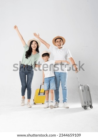 a family posing on a white background Royalty-Free Stock Photo #2344659109