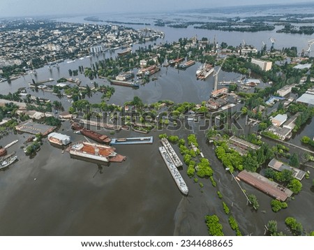 The flooded port of the city of Kherson after the explosion of the dam of the Kakhovka reservoir. Ecological catastrophe in Ukraine. Russian-Ukrainian war. Exclusive drone footage Royalty-Free Stock Photo #2344688665