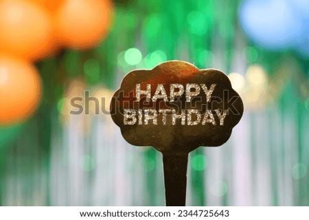 Happy Birthday designed beautifully with balloons and other decorative items