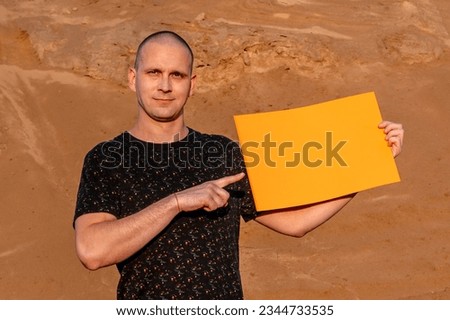 Man holding empty banner copy space.