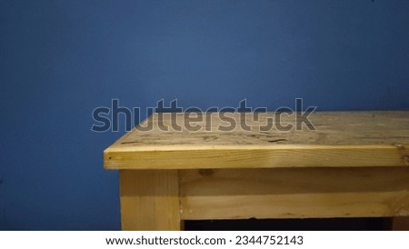 part of a corner of a wooden table