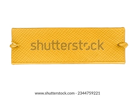Blank yellow leatherette clothes label patch isolated on white background Royalty-Free Stock Photo #2344759221