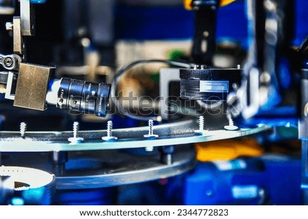 High-quality control in manufacturing optical sorting machine for fasteners screw in product line	 Royalty-Free Stock Photo #2344772823