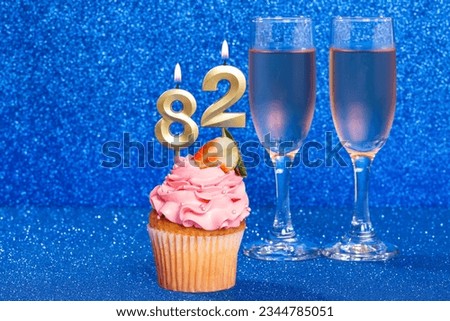Cupcake With Number For Celebration Of Birthday Or Anniversary; Number 82.